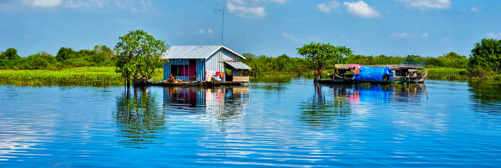 Foto de casa por un lago cerca de Siem Reap